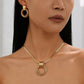 Moderne geometrische sieradenset met ketting en oorbellen