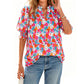 Dames zomerse top met bloemenprint en pofmouwen