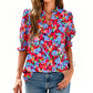 Dames zomerse top met bloemenprint en pofmouwen