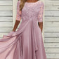 Elegante, zwierige cocktailjurk met borduursels