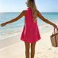 Dames minijurk met ruches en knoopsluiting